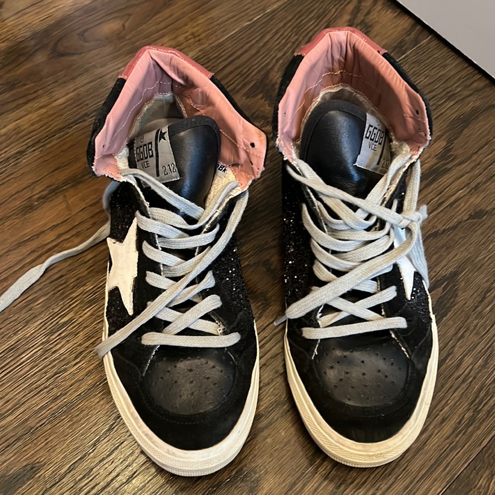 Black glitter golden goose high top sneakers with pink detailing and white star